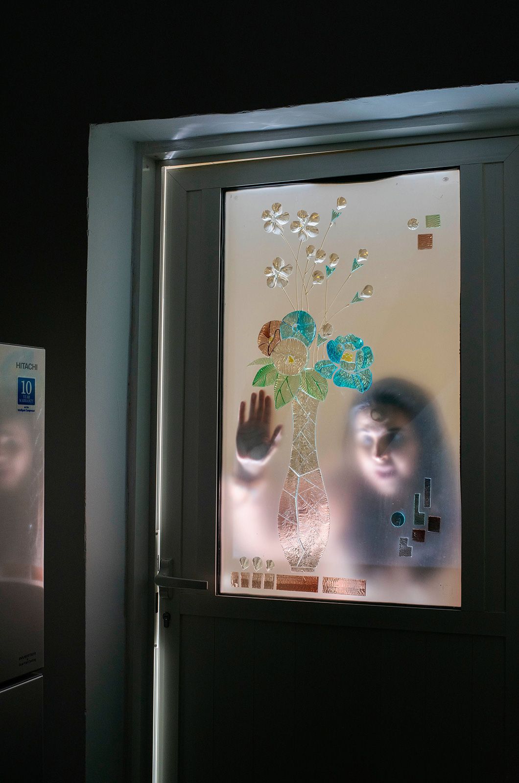 04 Woman in Bathroom Window  2022 C Farah Al Qasimi.jpg