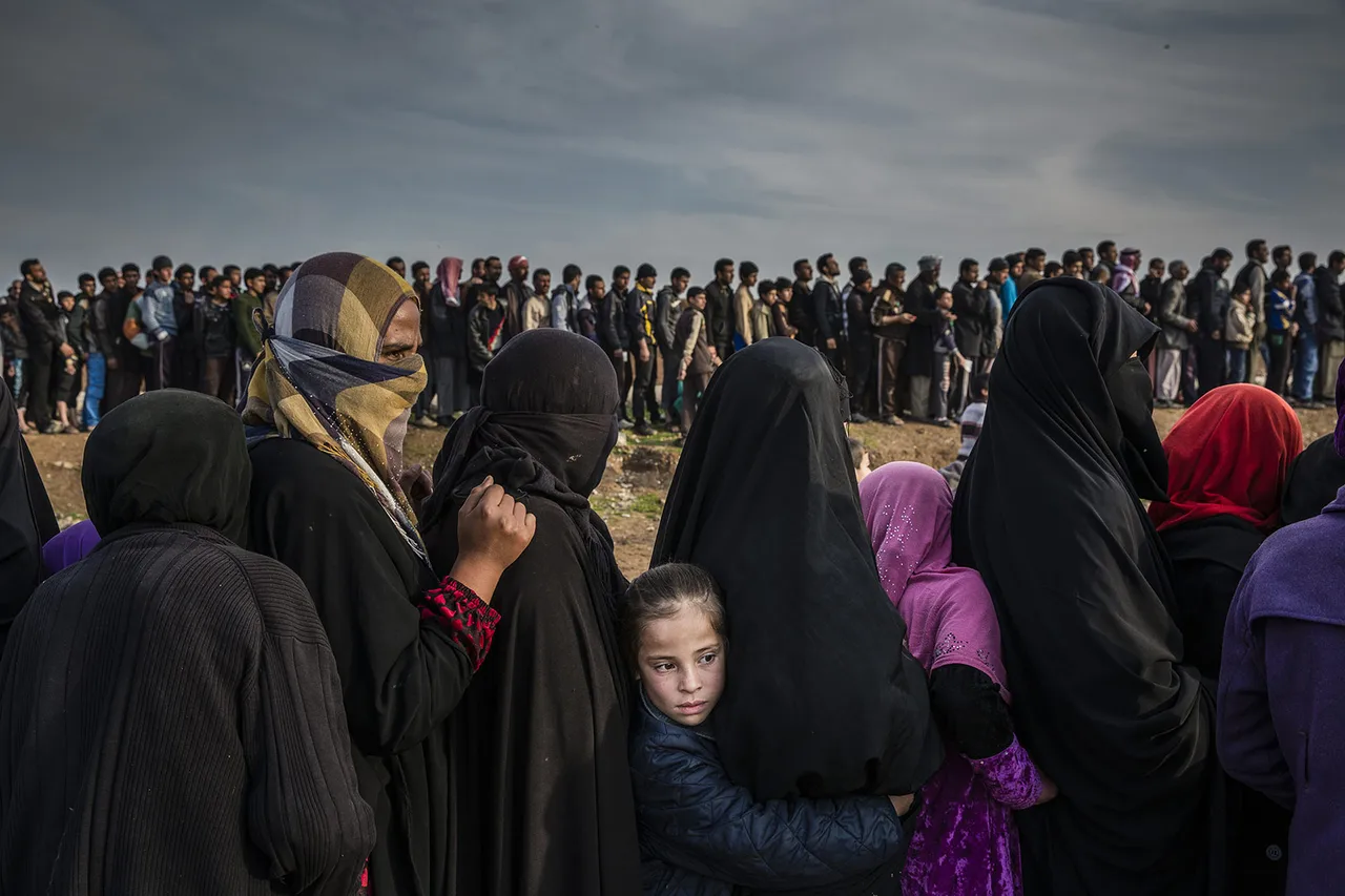 004 World Press Photo of the Year Nominee Ivor Prickett for the New York Times